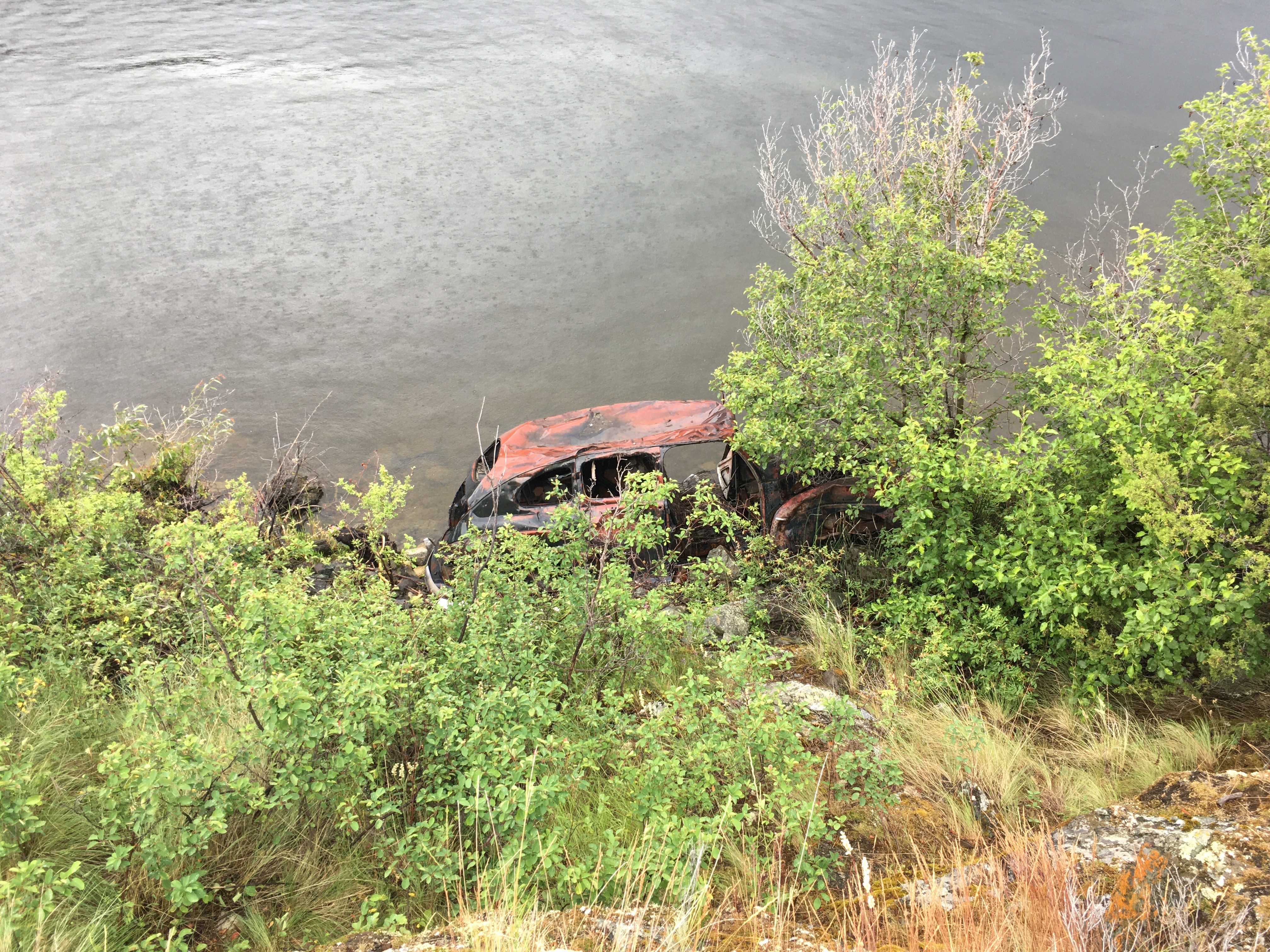 Rusty Car in Water